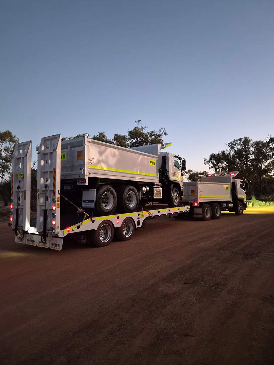 Tippers loaded for transport